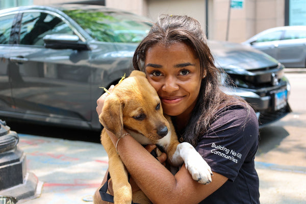 Woman at PAWS Chicago with rescue dog
