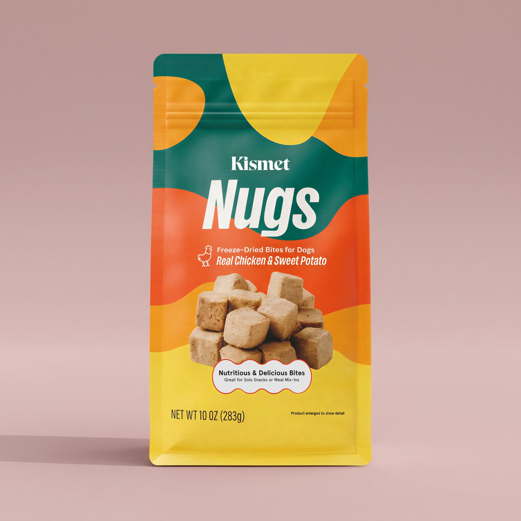 Kismet Nugs package for dogs with colorful design on a light pink background